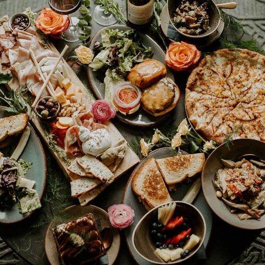 top down view of various food on circular table