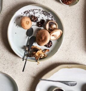 various mushroom varieties displayed on a plate