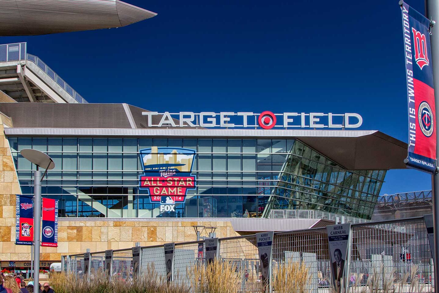 Target Field’s exterior in Minneapolis showcases large signage and a vibrant banner for the 2014 MLB All-Star Game.
